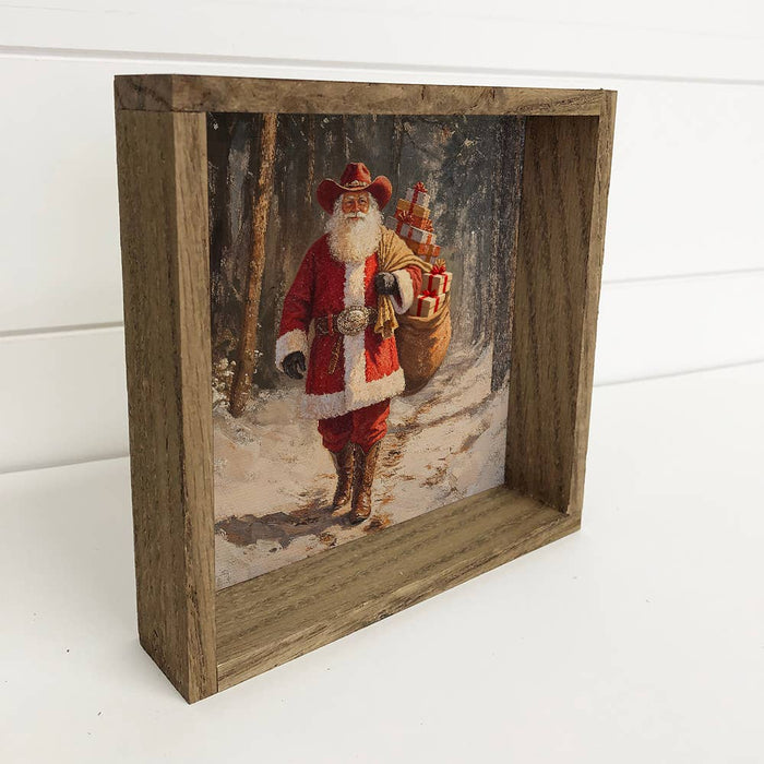 Hangout Home - Santa Cowboy Bag of Toys - Christmas Wall Art - Wood Framed: 15x15" Medium Canvas Art with Thick Wood Frame