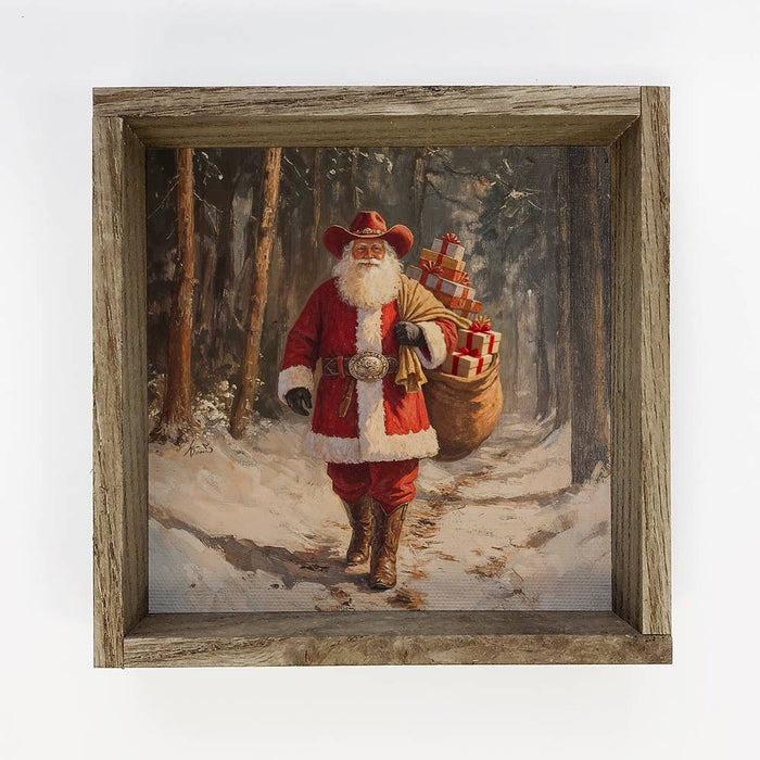 Hangout Home - Santa Cowboy Bag of Toys - Christmas Wall Art - Wood Framed: 15x15" Medium Canvas Art with Thick Wood Frame